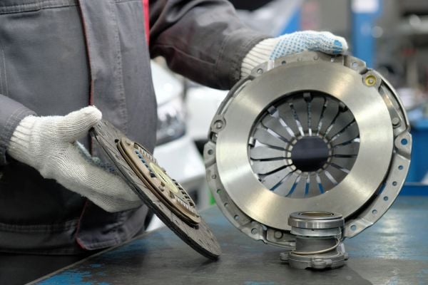 Car parts being handled by courier